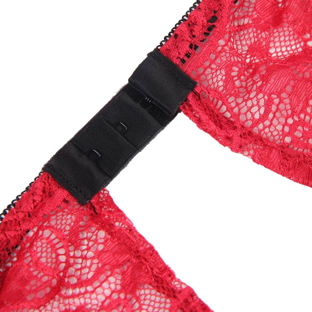 Red lace garment with a black elastic band on a white background