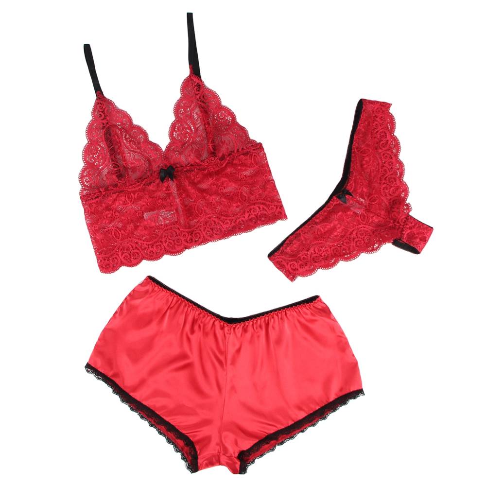 Red lace lingerie set with bra, panties, and garter on a white background