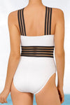 White swimsuit with black striped straps on a plain background