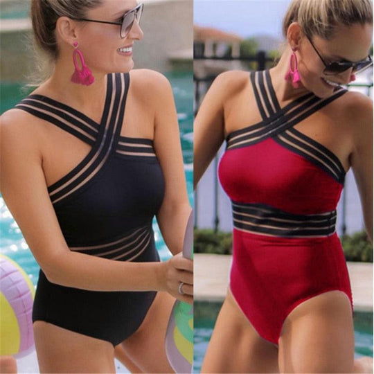 Two swimsuits, one black and one red, worn by a model by a pool.